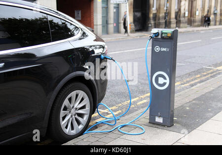 Electric car charging in Salford Stock Photo