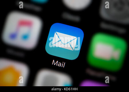A close-up shot of the Mail app, as seen on the screen of an Apple iPhone (Editorial use only) Stock Photo