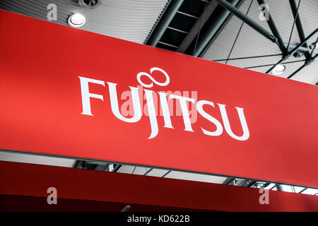 Fujitsu company logo sign on exhibition fair Cebit 2017 in Hannover Messe, Germany Stock Photo
