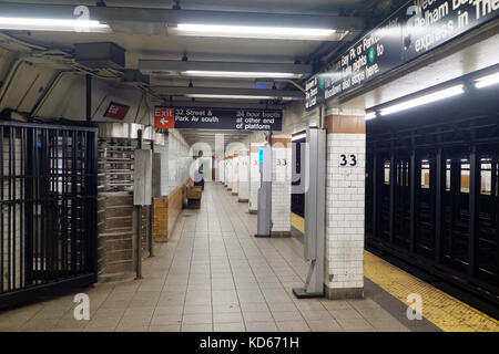 Subway platform at 33rd Street in Manhattan New York City, NY. Stock Photo