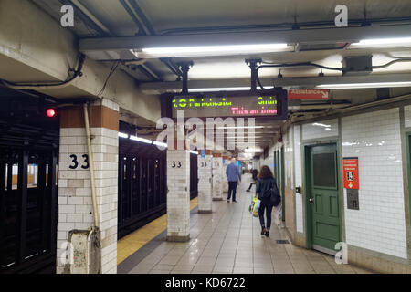 Subway platform at 33rd Street in Manhattan New York City, NY. Stock Photo