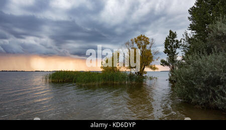 Sunset on the lake in the fall Stock Photo