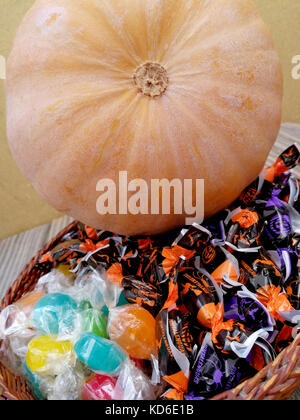 pumpkin and candies for halloween night Stock Photo