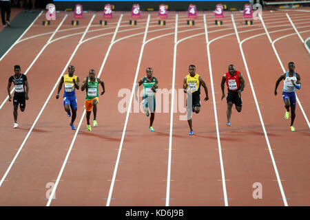 Reece PRESCOD (Great Britain), Alex WILSON (Switzerland), Julian FORTE (Jamaica), Akani SIMBINE (South Africa), Ben Youssef MEITÉ (Côte d'Ivoire, Ivory Coast), Mario BURKE (Barbados), Hassan SAAID (Maldives) competing in the Men's 100m Heat 3 at the 2017, IAAF World Championships, Queen Elizabeth Olympic Park, Stratford, London, UK. Stock Photo