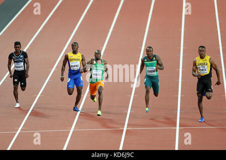 Julian FORTE (Jamaica), Akani SIMBINE (South Africa), Ben Youssef MEITÉ (Côte d'Ivoire, Ivory Coast), Mario BURKE (Barbados), Hassan SAAID (Maldives) competing in the Men's 100m Heat 3 at the 2017, IAAF World Championships, Queen Elizabeth Olympic Park, Stratford, London, UK. Stock Photo