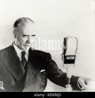 Beecham, Sir Thomas,  sitting in front of a microphone English conductor & impresario, 29 April 1879 - 8 March 1961 Stock Photo