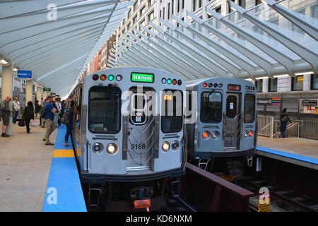 The modern downtown 'L' train station at Washington and Wabash provides a fitting entry for tourists visiting Millennium Park in Chicago. Stock Photo