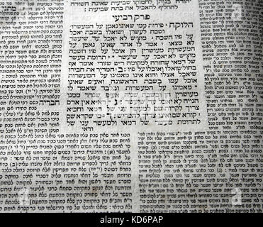 Gemara or Talmud - open page showing post-exilic (4th to 8th century) rabbinic commentary on the Mishnah (central text), surrounded by explications of 11-12th century rabbis, Rashi and the Tosafists. Photo shows 19th century printed version in traditional layout Stock Photo