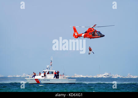 Fort Lauderdale, Florida - May 5, 2007: US Coast Guard crews conduct rescue operation at sea. The safety  training event is part of the Air and Sea Sh Stock Photo