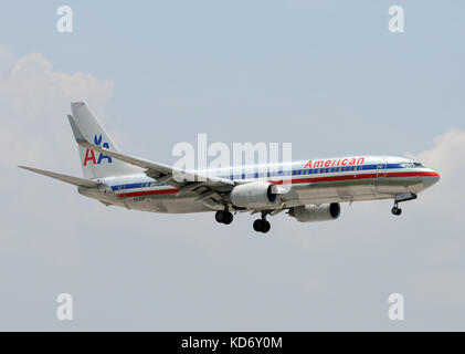 Miami, USA - May 14, 2011: American Airlines Boeing 737-800 passenger jet landing at Miami International. Miam i is a major hub for American Airlines. Stock Photo