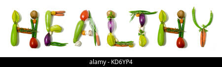 Word 'Healthy' written with vegetables as a  concept for healthy lifestyle, vegetarian or vegan diet, getting fit or reducing calories Stock Photo