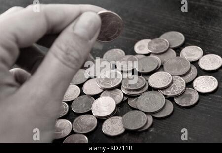 Small Euros cent coins in hand Stock Photo