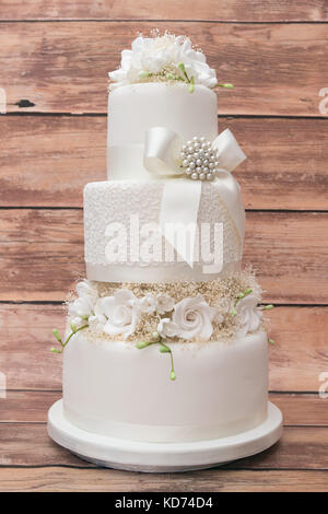 White three tiered wedding cake Stock Photo
