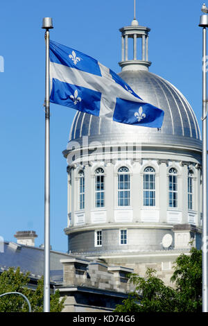 Quebec flag in the wind in Old Montreal. Stock Photo