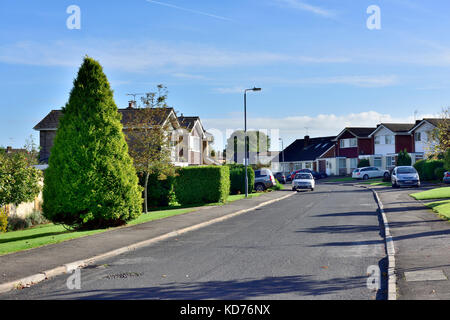 Road and houses in small English village of Alveston on outskirts of Bristol Stock Photo