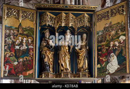 Altar of St Catherine, from workshop of Michael Wolgemut, c1485-90. The Saint is flanked by Saints Livinus and Helen. St. Lorenz Church, Nuremberg Stock Photo