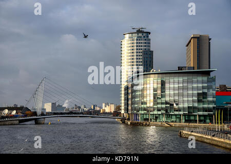 Foot bridge cross Manchester ship canal, connecting between Media City and Imperial War Museum at Salford quays in Manchester city, England, Stock Photo