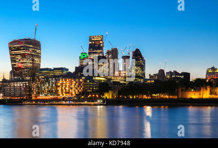 The view of London's city hall and modern skyscrapers at night Stock Photo