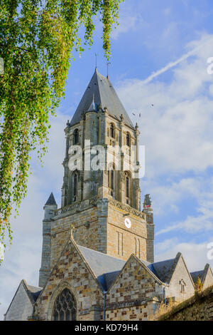 View of the church tower in the village Orbec, in the Calvados department in the Normandy region in northwestern France Stock Photo