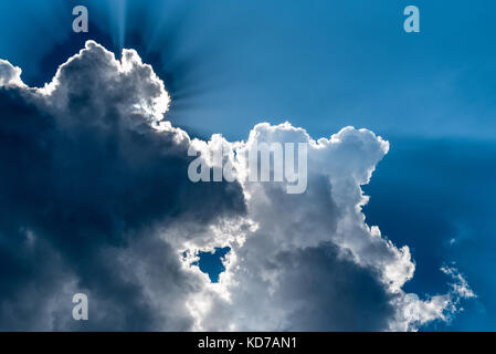 Sun rays and cloud. Stock Photo