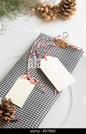 checkered napkin and labels, Christmas table Stock Photo