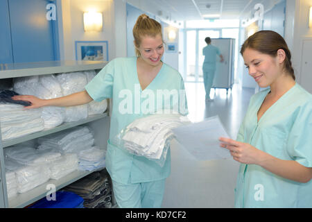 nurses speaking in hospital corridor Stock Photo