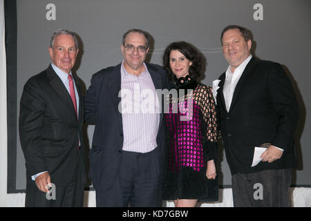 (L-R) New York Mayor Michael Bloomberg, film executive Bob Weinstein, New York City Film Commissioner Katherine Oliver and film executive Harvey Weinstein onstage as a 'Made In NY Award' is presented to film executives Bob Weinstein and Harvey Weinstein at the 8th Annual 'Made In NY Awards' at Gracie Mansion on June 10, 2013 in New York City. Stock Photo