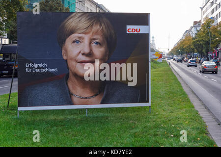 Poster of German Chancellor Angela Merkel for the general election in Germany 2017 at a street in Berlin, Germany Stock Photo