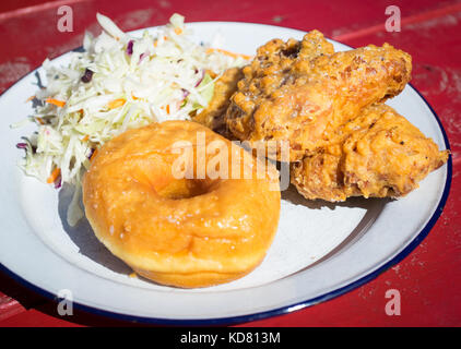 Fried chicken and donuts (fried chicken and donut) from Have Mercy, a popular US southern food restaurant in Edmonton, Alberta, Canada. Stock Photo