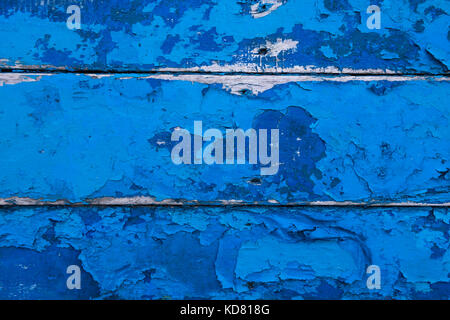 Crackled painted wooden fishing boat hull Stock Photo