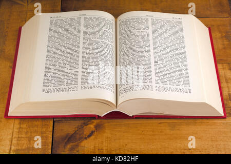 Composition with vintage old hardback books on wooden desk table. Education background. Stock Photo
