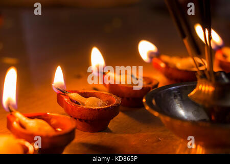 Celebrating Diwali the festival of light, as a symbol of good winning against evil Stock Photo