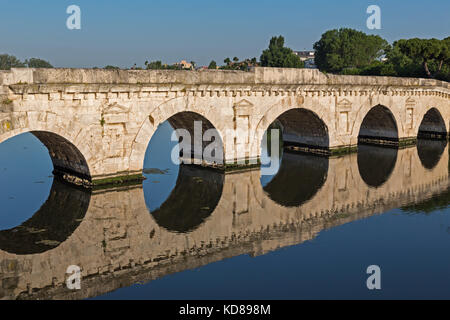 Rimini, Rimini Province, Italy. The Bridge of Tiberius or Bridge of Augustus crossing the Marecchia river.  The bridge  was started in the reign of th Stock Photo