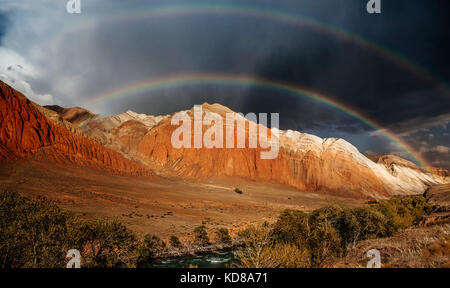 Double Rainbow over Kyrgyz Mountains, Kyrgyzstan Stock Photo