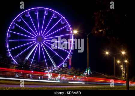 Amusement park - carousel at night /  Amusement Park at night - Oktoberfest Stock Photo