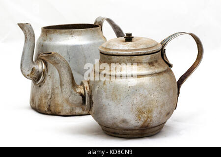 Vintage Metal Tea Pot and Milk Pot, Stained Metal, Isolated on White Background Stock Photo