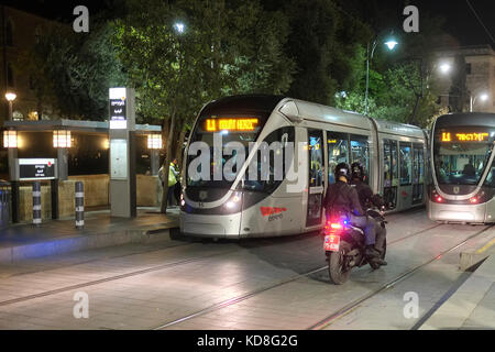 Policemen of the Yasam Israel Police Special Patrol Unit riding along the Jerusalem Light Rail or Jerusalem Tramway route in Jaffa road in West Jerusalem Israel Stock Photo