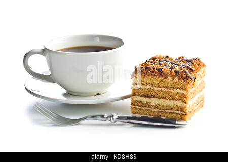 Cake with walnuts and honey and coffee cup isolated on white background. Stock Photo
