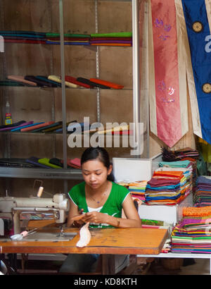 Tailor dressmaker working in Siem Reap market Stock Photo