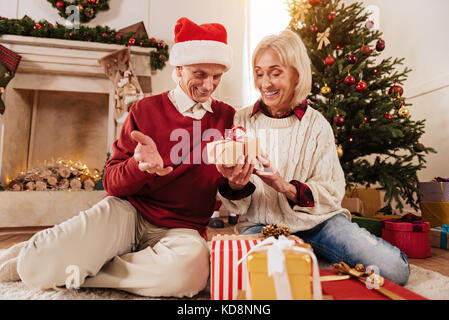 Shocked man getting unexpected surprise Stock Photo