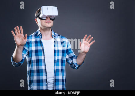 Nice good looking man testing 3d reality glasses Stock Photo