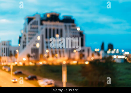 Batumi, Adjara Georgia. Abstract Natural Blurred Bokeh Boke Background Of Illuminated Hotel In Batumi Built On Black Sea Coast Stock Photo