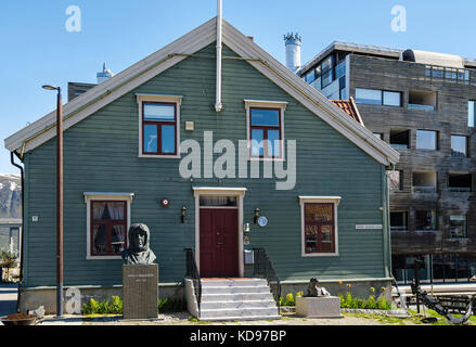 Roald Amundsen statue sculpture outside old wooden building in Polarmuseet or Polar Museum. Tromso, Troms county, Norway, Scandinavia Stock Photo