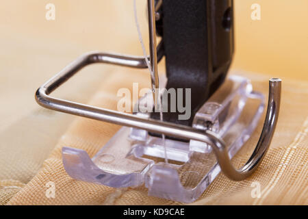 Close-up of sewing machine. Isolated on white Stock Photo