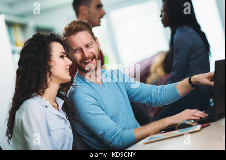 Software engineers working on project and programming in company Stock Photo