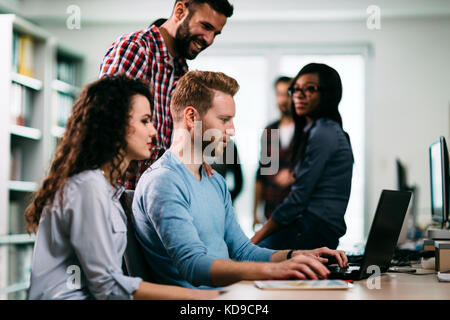 Portrait of programmers working in development software company Stock Photo