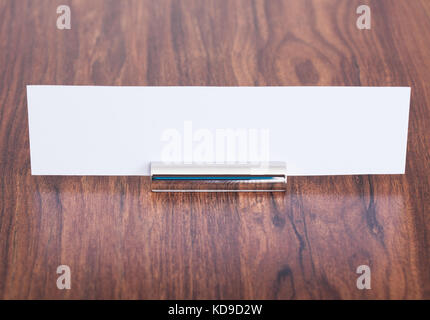 Close-up Of A Name Plate On Desk Stock Photo