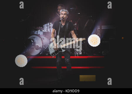 Turin, Italy. 10th Oct, 2017. The Italian singer and song writer Luciano Ligabue performing live on stage at the Pala Alpitour in Torino for his 'Made in Italy' tour 2017. Credit: Alessandro Bosio/Pacific Press/Alamy Live News Stock Photo