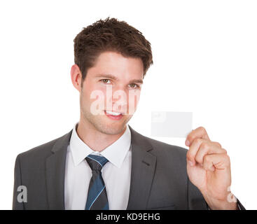 Young Businessman Showing Visiting Card Isolated On White Background Stock Photo