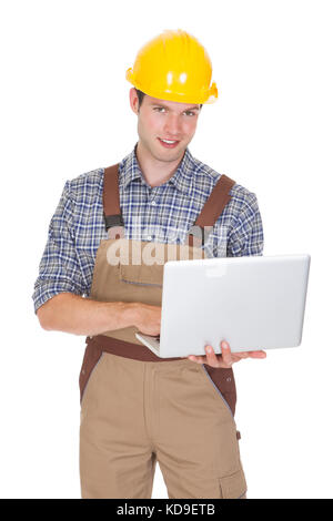 Happy Male Architect Using Laptop Isolated On White Background Stock Photo